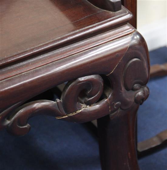 A large Chinese hardwood bench, late 19th / early 20th century, L.224cm